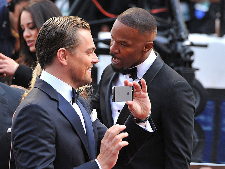 Welches darf's denn sein? Leo DiCaprio und Jamie Foxx unterhalten bei den Oscars vielleicht über iPhones