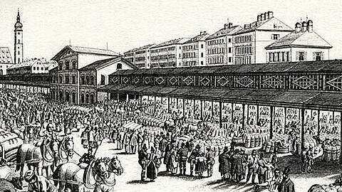 So sah die Schrannenhalle einmal aus: Ein riesiger Koloss, den Karl Muffat 1851 bis 1853 als Markthalle für Getreide am Rand des Viktualienmarktes errichtet hat.