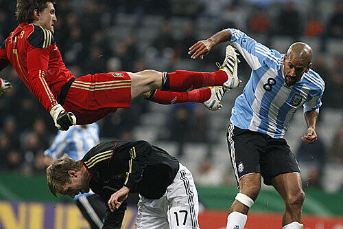 Rene Adler, Per Mertesacker und  Juan Sebastian Veron