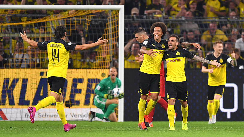 Feiern das 1:0: Nico Schulz (l-r), Axel Witsel, Paco Alcacer und Marco Reus.