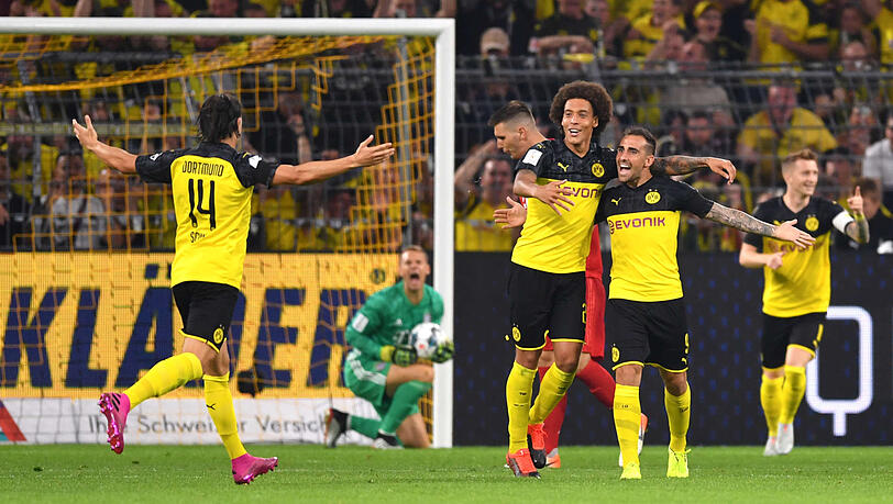 Feiern das 1:0: Nico Schulz (l-r), Axel Witsel, Paco Alcacer und Marco Reus. Feiern das 1:0: Nico Schulz (l-r), Axel Witsel, Paco Alcacer und Marco Reus.