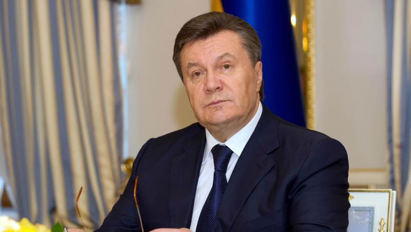 Der ehemalige ukrainische Staatspräsident Viktor Janukowitsch nach der Unterzeichnung einer Vereinbarung zur Krisenlösung im Jahr 2014. Der ehemalige ukrainische Staatspräsident Viktor Janukowitsch nach der Unterzeichnung einer Vereinbarung zur Krisenlösung im Jahr 2014.