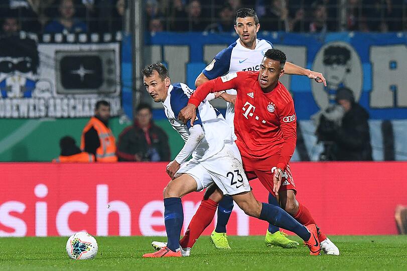 Corentin Tolisso, hier im Zweikampf mit Robert Tesche, fand gegen Bochum nicht ins Spiel.