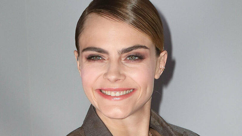 Model Cara Delevingne nahm in der ersten Reihe Platz