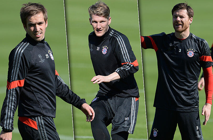 Ein Teil von Bayerns Ü30: Philipp Lahm (l), Bastian Schweinsteiger und Xabi Alonso (r).