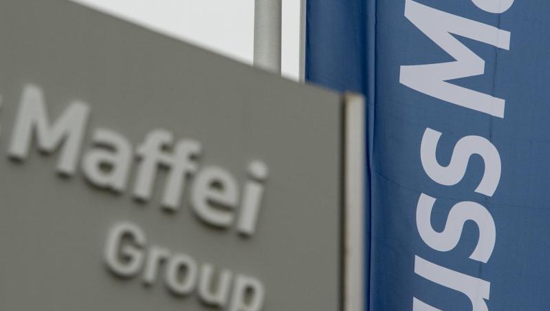 Das Logo der "KraussMaffei Group" ist an einem Eingang zum Werksgelände in Allach bei München (Bayern) auf einer Fahne zu sehen. Foto: picture alliance / dpa/Archivbild Das Logo der "KraussMaffei Group" ist an einem Eingang zum Werksgelände in Allach bei München (Bayern) auf einer Fahne zu sehen. Foto: picture alliance / dpa/Archivbild