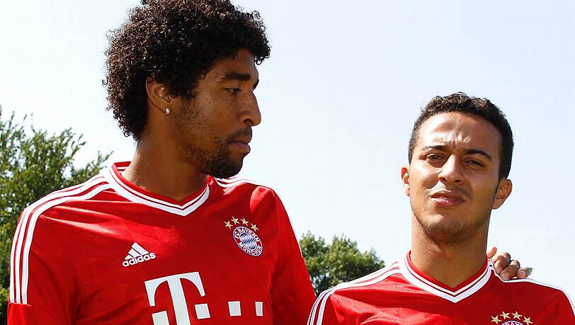 Dante (l.) und Bayerns Neuzugang Thiago Alcántara. Dante (l.) und Bayerns Neuzugang Thiago Alcántara.