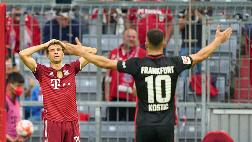 Filip Kostic (r.) und ein Kevin Trapp in Über-Form lassen den FC Bayern um Thomas Müller (l.) verzweifeln.