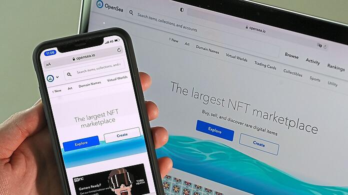 Geschäfte mit NFTs laufen über Handy und Computer, angeblich mit sagenhaften Gewinnmöglichkeiten.  Jens Kalaene, dpa