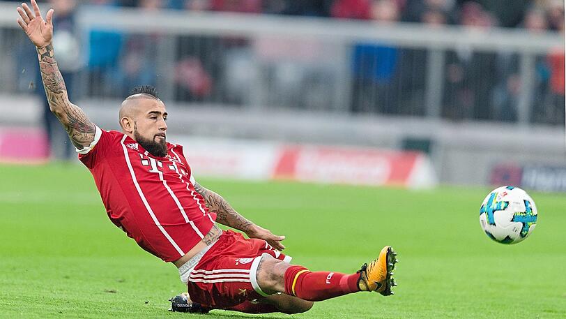 "Das hat er bestimmt bei mir gesehen", sagt Handballer Pascal Hens (r.) - Markenzeichen: Irokesen-Schnitt - über Bayern-Star Arturo Vidal und dessen Frisur.