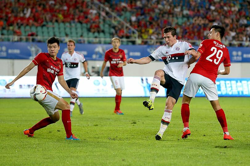 Im Freundschaftsspiel gegen Guangzhou Evergrande musste sich der FC Bayern im Elfmeterschießen geschlagen geben. Die Bilder vom Abschluss der China-Reise.