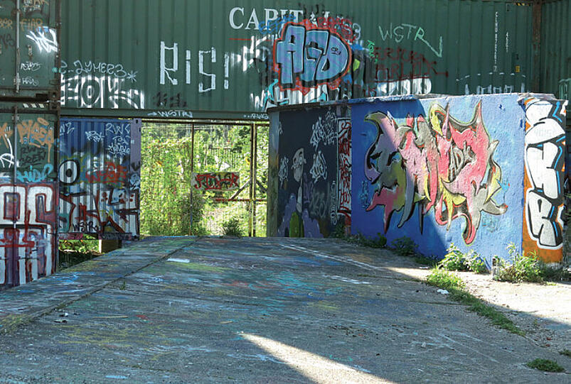 Graffiti-Kunst an Containern im Viehhof.