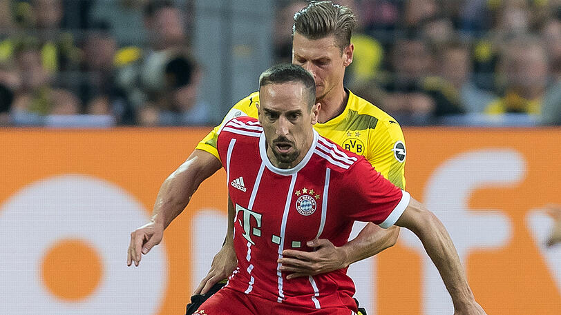 Franck Ribery (vorne) im Zweikampf mit dem Dortmunder Lukasz Piszczek.