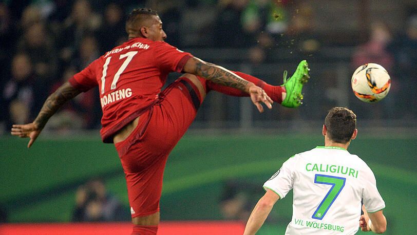 Bayern-Star Jerome Boateng (l.) im Spiel gegen Wolfsburg Bayern-Star Jerome Boateng (l.) im Spiel gegen Wolfsburg