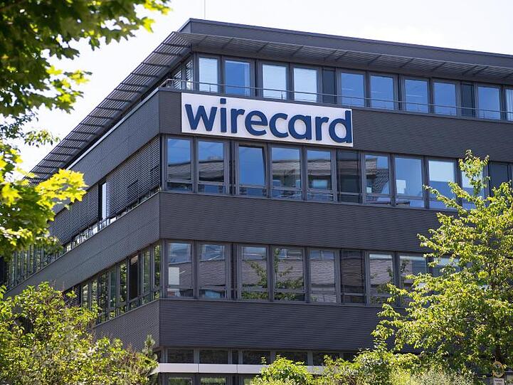 Der Schriftzug von Wirecard prangt an der Firmenzentrale. Foto: Sven Hoppe/dpa/Symbolbild