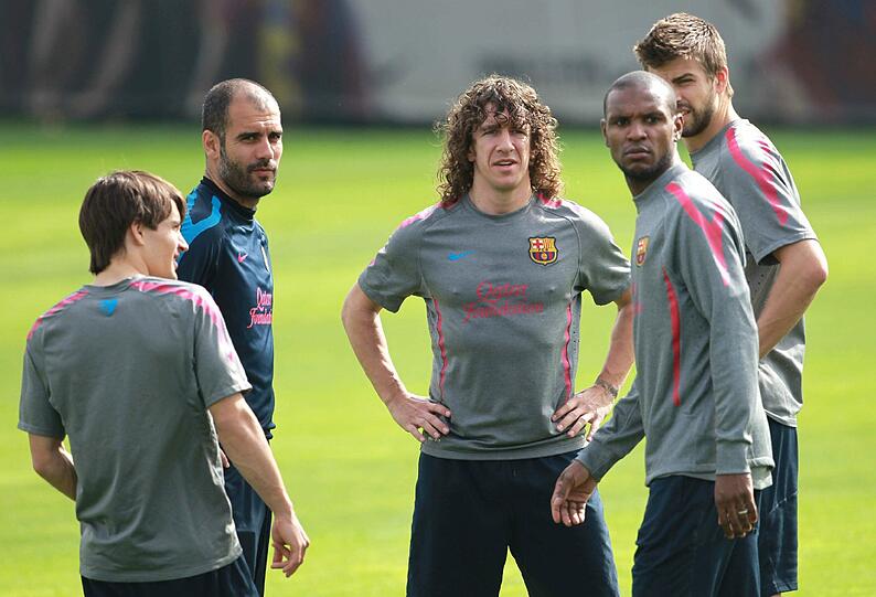Archivbild: Carlos Puyol und Pep Guardiola beim Barca-Training.