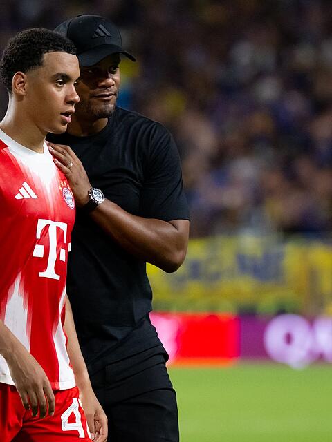 Bem&uuml;ht um Normalit&auml;t vor dem Comeback: Jamal Musiala und Trainer Vincent Kompany. (Archivbild)