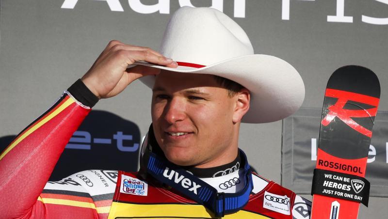 Thomas Dreßen aus Deutschland jubelt auf dem Podium über seinen Sieg. F. Foto: Jeff Mcintosh/The Canadian Press/AP/dpa Thomas Dreßen aus Deutschland jubelt auf dem Podium über seinen Sieg. F. Foto: Jeff Mcintosh/The Canadian Press/AP/dpa