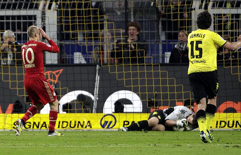 Es war das mit Spannung erwartete Gigantenduell, das vorgezogene Finale der Bundesliga - Dortmund gegen Bayern: die Bilder vom Spiel.