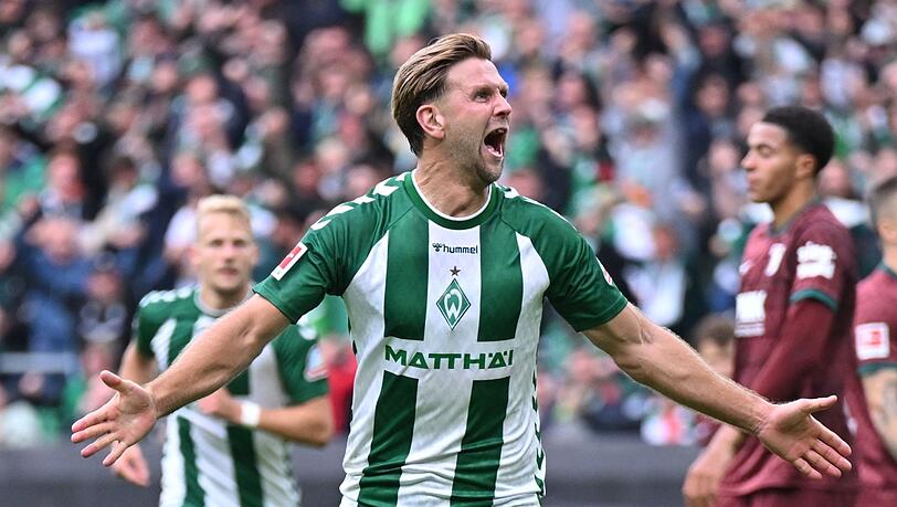 Niclas Füllkrug jubelt über sein Tor gegen Augsburg. Niclas Füllkrug jubelt über sein Tor gegen Augsburg.