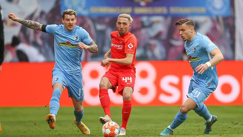 Leipzigs Kevin Kampl (M) in Aktion.