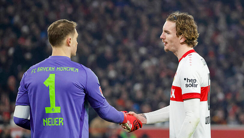Bayern-Keeper Manuel Neuer und VfB-Stürmer Nick Woltemade – hier bei einem Handschlag am 24. Spieltag der Bundesligasaison 2024/2025 zwischen dem VfB Stuttgart und dem FC Bayern München. Nach der Partie im Supercup hat Neuer einen neuen Spitznamen für Woltemade.
