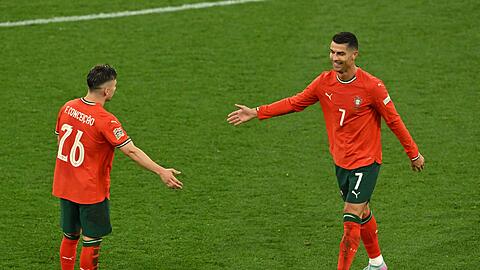 Portugals Torschützen und Matchwinner: Joker Francisco Conceição (l) und Kapitän Cristiano Ronaldo.