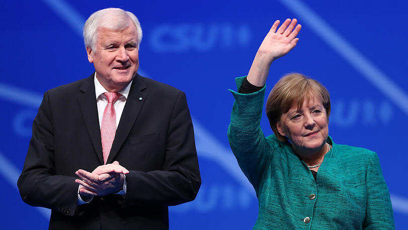 Eine Liebe wie ein deutscher Schlager: Horst Seehofer und Angela Merkel. Eine Liebe wie ein deutscher Schlager: Horst Seehofer und Angela Merkel.