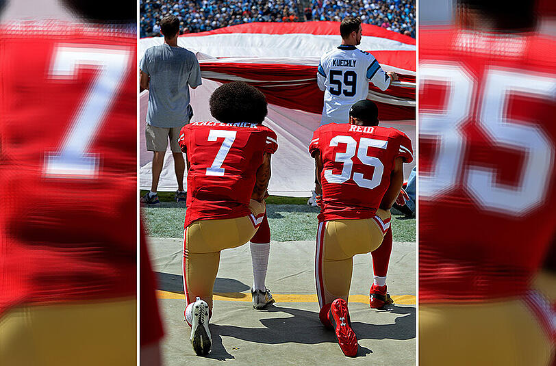 San Franciscos Kaepernick (l.) und sein Teamkollege Reid knien bei der US-Hymne.