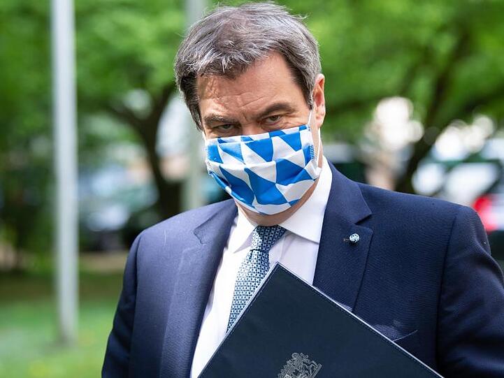 Markus Söder (CSU) mit Mundschutz. Foto: Sven Hoppe/dpa/Archivbild