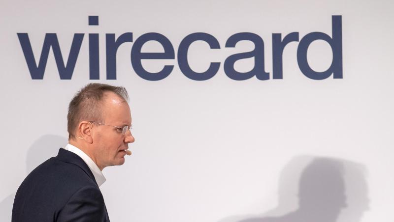 Markus Braun vor dem Wirecard-Logo.