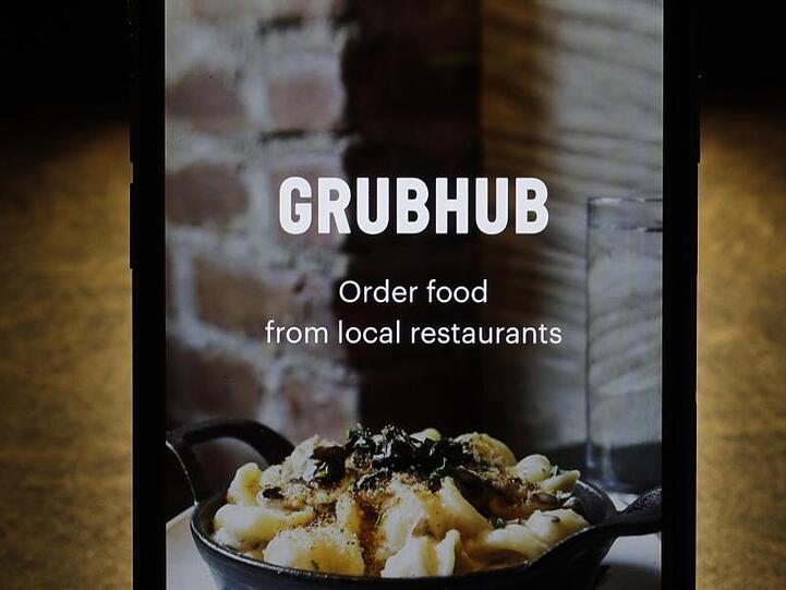 Die Grubhub-App auf einem iPhone. Der britisch-niederländische Essenslieferdienst Just Eat Takeaway übernimmt den US-Rivalen Grubhub.