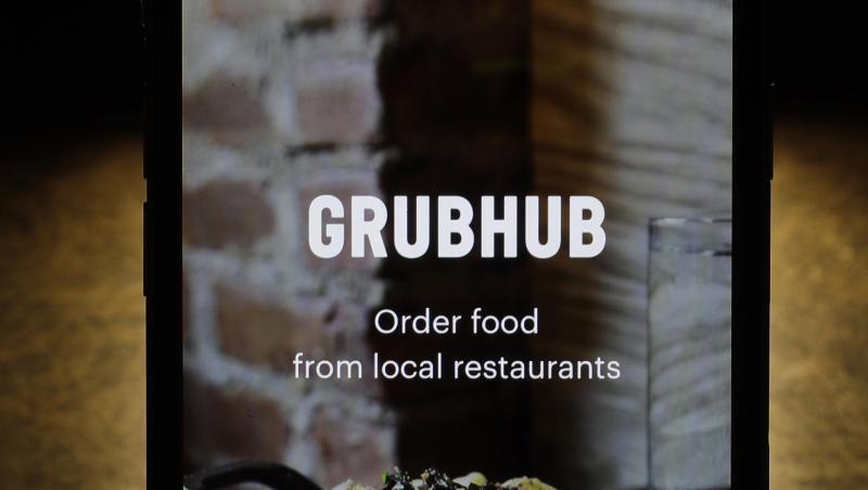 Die Grubhub-App auf einem iPhone. Der britisch-niederländische Essenslieferdienst Just Eat Takeaway übernimmt den US-Rivalen Grubhub. Die Grubhub-App auf einem iPhone. Der britisch-niederländische Essenslieferdienst Just Eat Takeaway übernimmt den US-Rivalen Grubhub.