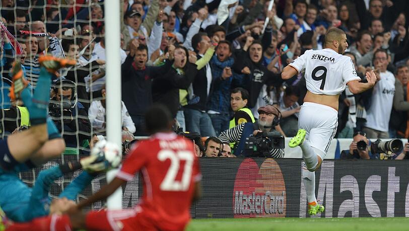 Der Treffer mitten hinein ins Bayern-Herz: Karim Benzema trifft zum 1:0 für Real Madrid. Neuer und Alaba sind geschlagen. Der Treffer mitten hinein ins Bayern-Herz: Karim Benzema trifft zum 1:0 für Real Madrid. Neuer und Alaba sind geschlagen.