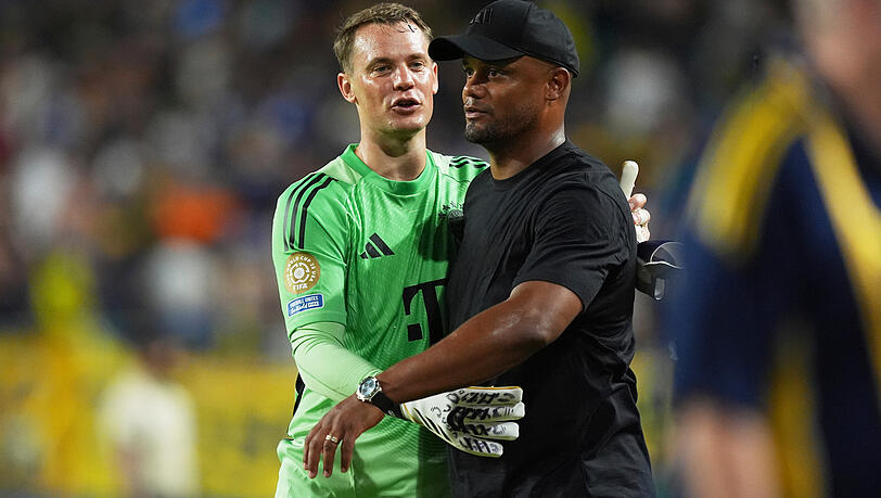 Manuel Neuer und Trainer Vincent Kompany.