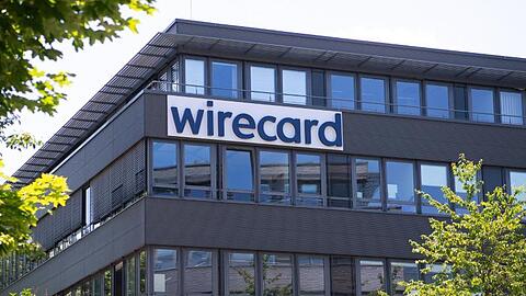Der Schriftzug von Wirecard ist an der Firmenzentrale zu sehen. Foto: Sven Hoppe/dpa/Symbolbild