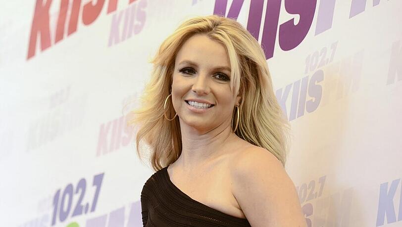 Pop-Star Britney Spears lächelt für die Kameras Pop-Star Britney Spears lächelt für die Kameras
