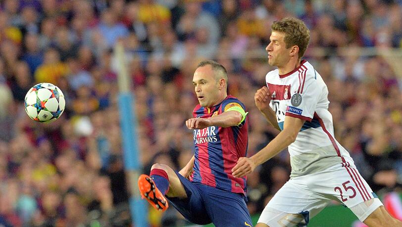 Thomas Müller (r.) gegen Andrés Iniesta beim Halbfinal-Hinspiel in der Chanpions League Thomas Müller (r.) gegen Andrés Iniesta beim Halbfinal-Hinspiel in der Chanpions League