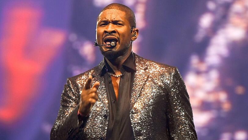 Usher auf der B&uuml;hne.