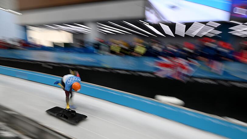 Skeleton-Weltmeister Christopher Grotheer aus Deutschland in Aktion bei den Olympischen Winterspielen in Peking.