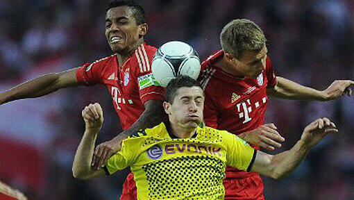 Duell im Pokalfinale 2012: Luiz Gustavo und Holger Badstuber nehmen BVB-Torjäger Robert Lewandowski in die Zange. Dortmund gewann 5:2. Duell im Pokalfinale 2012: Luiz Gustavo und Holger Badstuber nehmen BVB-Torjäger Robert Lewandowski in die Zange. Dortmund gewann 5:2.
