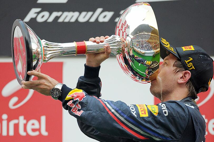 Sebastian Vettel hat das erste Formel-1-Rennen in Indien gewonnen. Die Bilder von der Siegerehrung und der Fahrt zum Triumph.
