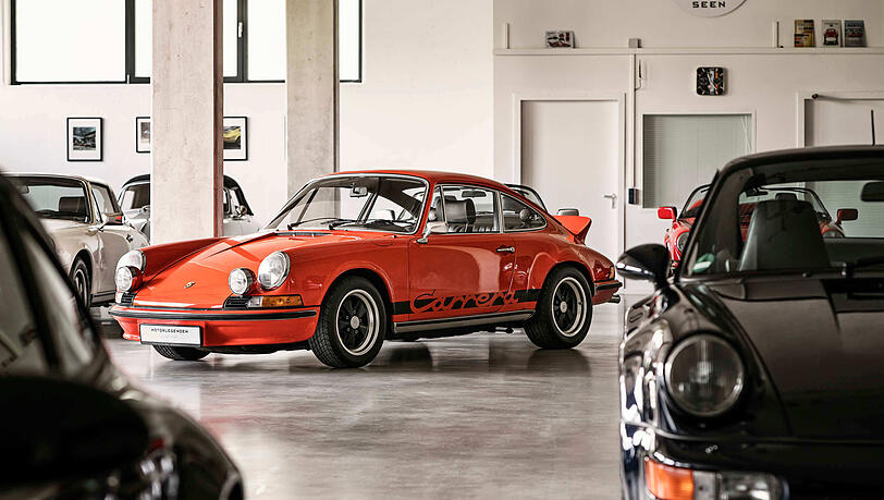 Ein seltener Porsche 911 2.7 Carrera RS in der Farbe Blutorange, Wert aktuell ca. 650.000 Euro. Ein seltener Porsche 911 2.7 Carrera RS in der Farbe Blutorange, Wert aktuell ca. 650.000 Euro.