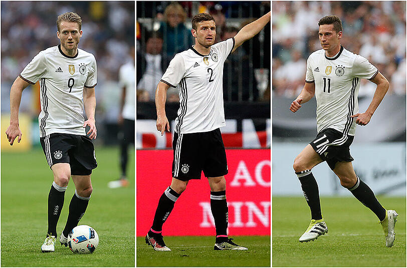 Die Hiwi-Weltmeister: André Schürrle, Shkodran Mustafi und Julian Draxler (v.l.).