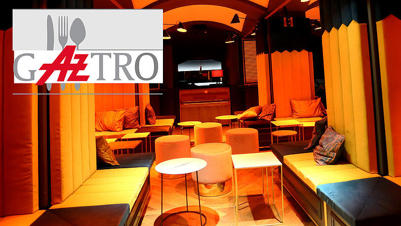 Der Salon Pitzelberger im Gärtnerplatztheater: Lounge-Atmosphäre in Gelb und Orange.