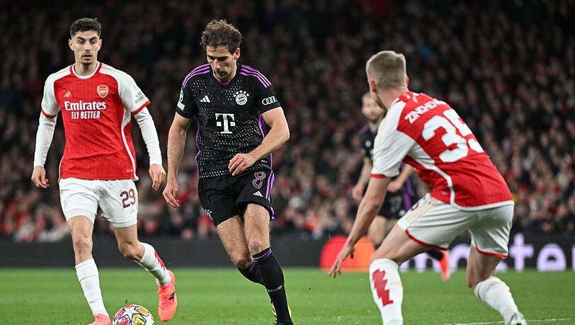 Leon Goretzka (M) und die Bayern nehmen ein 2:2 aus London mit.