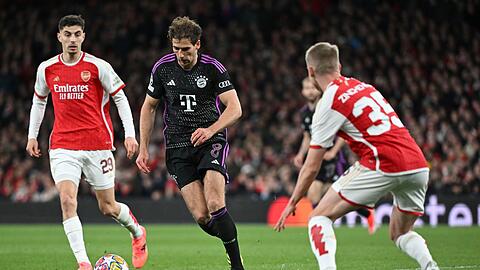 Leon Goretzka (M) und die Bayern nehmen ein 2:2 aus London mit.