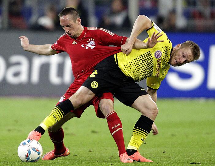 Es war das mit Spannung erwartete Gigantenduell, das vorgezogene Finale der Bundesliga - Dortmund gegen Bayern: die Bilder vom Spiel.