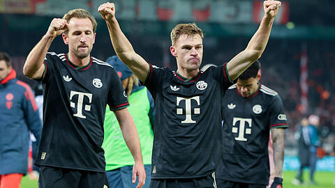 Anführer des FC Bayern beim 3:2-Erfolg im Pokal bei Union Berlin: Joshua Kimmich (r.) und Torschütze Harry Kane.