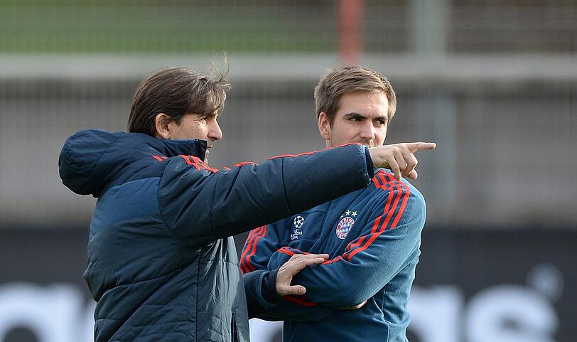 Domenec Torrent redet mit Philipp Lahm